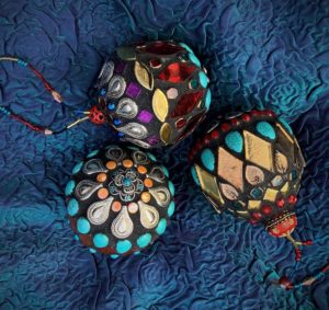 three round ornaments with mosaic finish