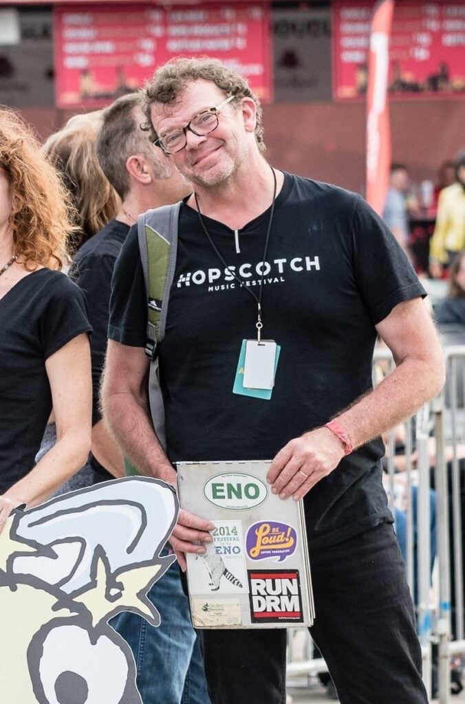 Greg with clipboard at Hopscotch Music Festival